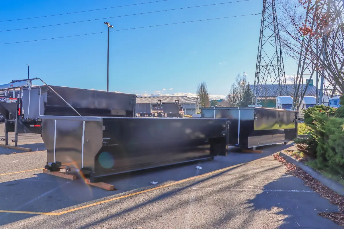 Roll-off dumpster ready for waste disposal at job site for Construction Dumpster Rental in Sugar Land